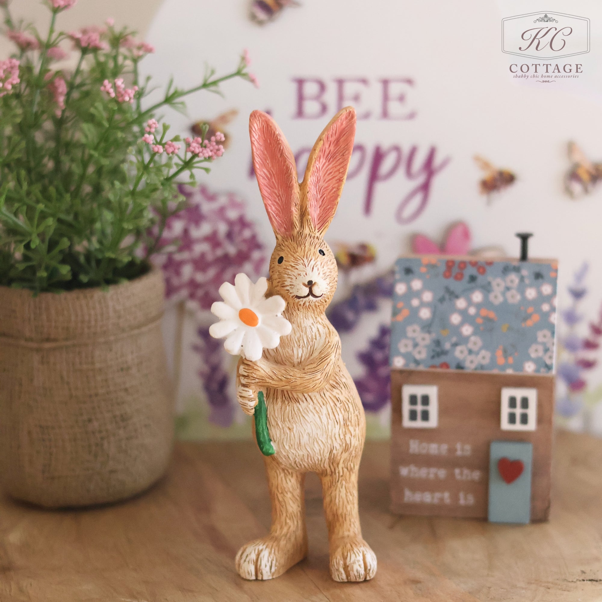 Standing Bunny Holding Daisy Flower