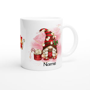 The Personalised Christmas Gonk Mug features a festive design with a gnome wearing a red and white hat, surrounded by small marshmallows and holding hot cocoa. With space for a customisable name near the bottom, this white mug adds a festive touch to your holiday celebrations.